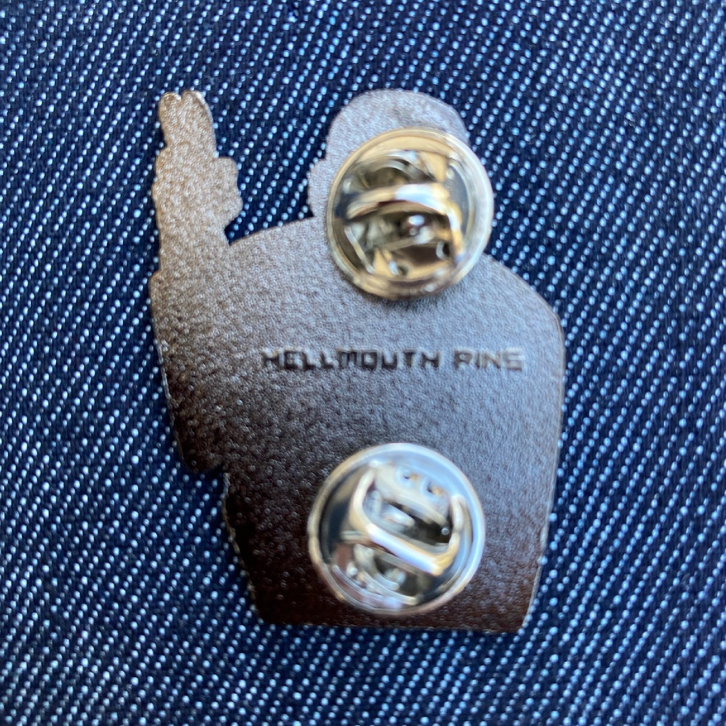 The back of the Master enamel pin